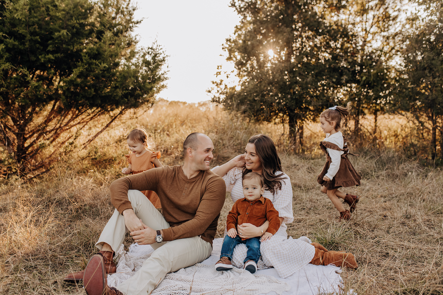 San Antonio Family photography session in a field with golden, boho color schemes.